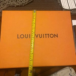 2 Louis Vuitton shoe boxes.